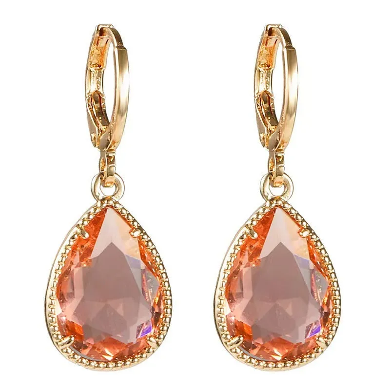 Hand-carved glass water drop earrings with geometric Saturn design in various colours