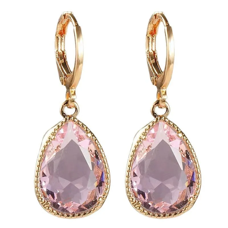 Hand-carved glass water drop earrings with geometric Saturn design in various colours
