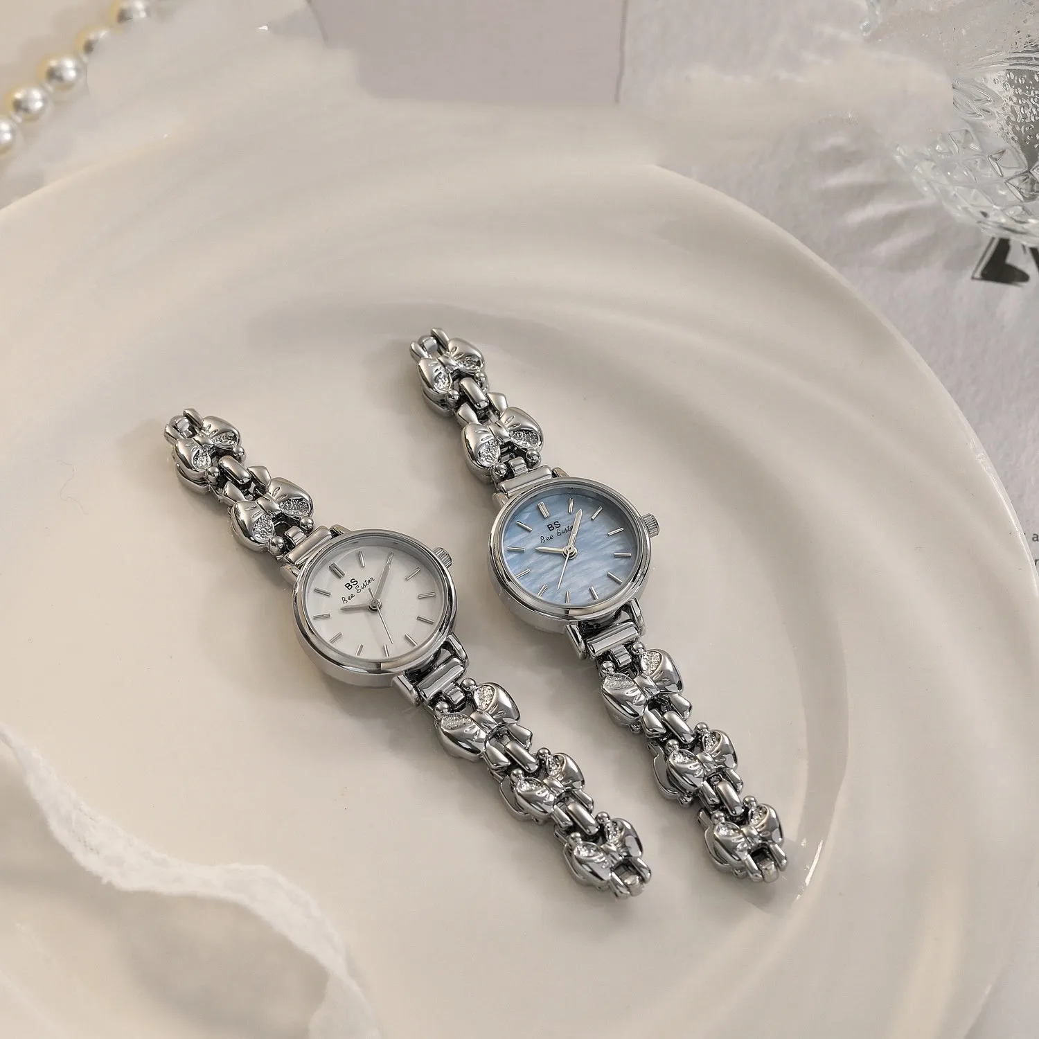 Women's retro French style alloy watch with 7mm slim case in golden white finish