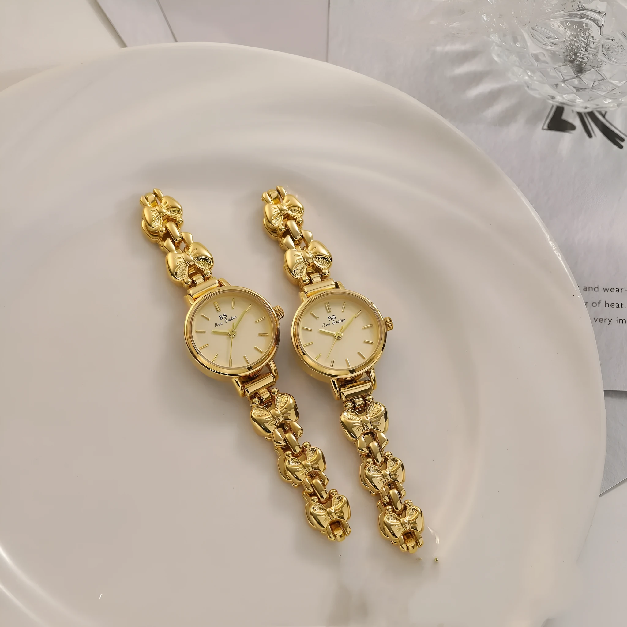 Women's retro French style alloy watch with 7mm slim case in golden white finish