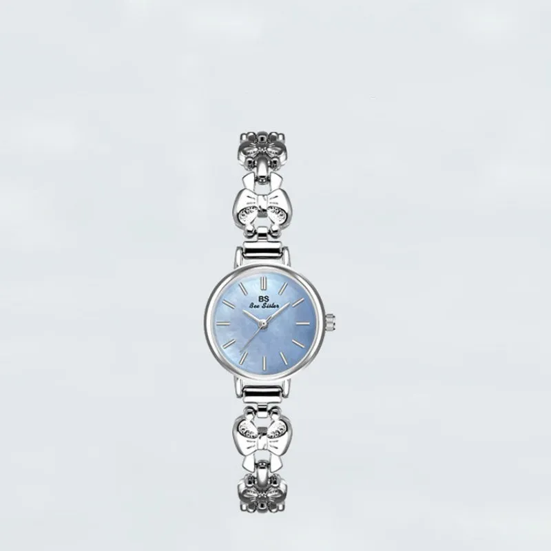 Women's retro French style alloy watch with 7mm slim case in golden white finish