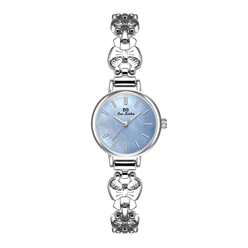 Women's retro French style alloy watch with 7mm slim case in golden white finish