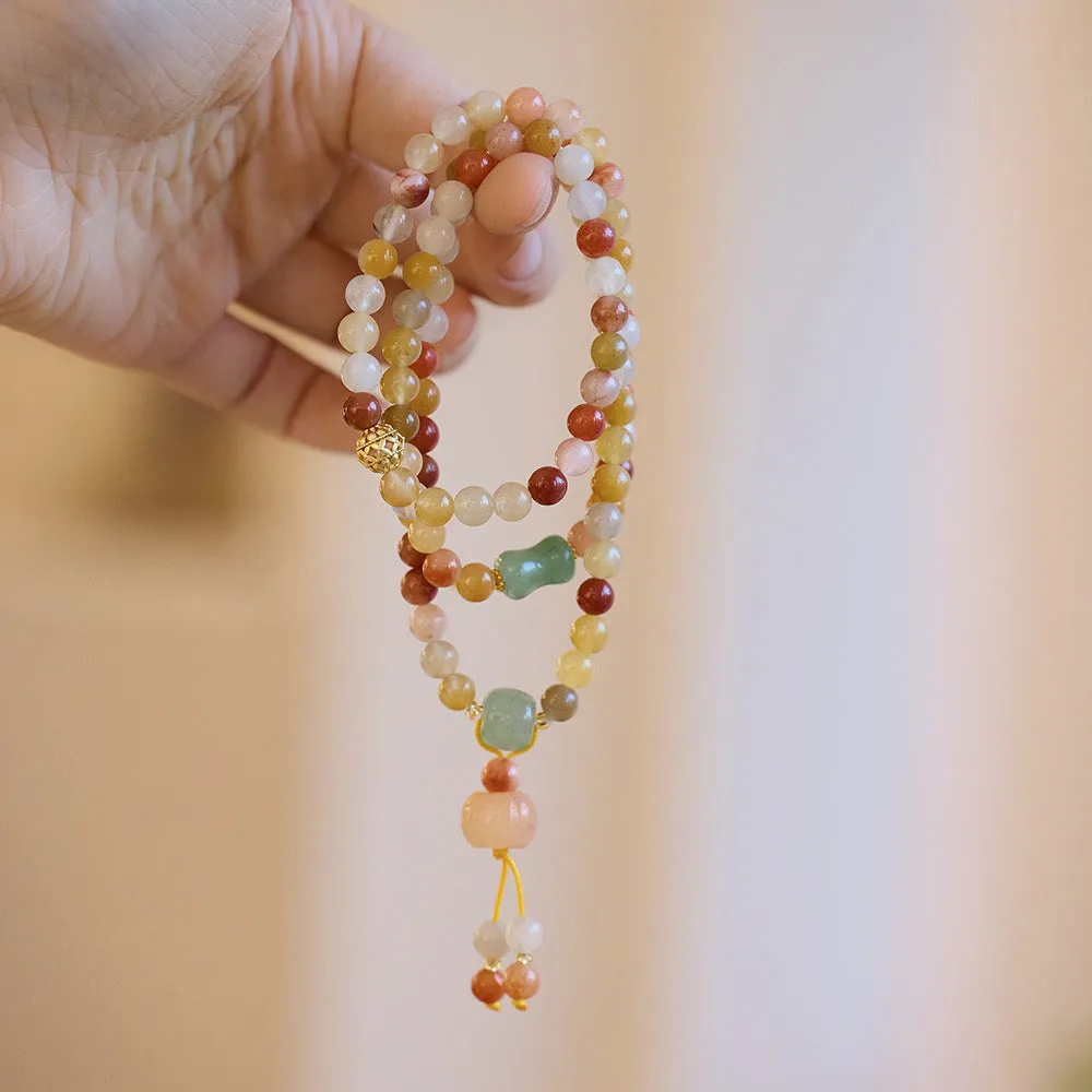 Women's Jinsi Jade bracelet with three-circle pumpkin design and tassels for 14-16cm wrists