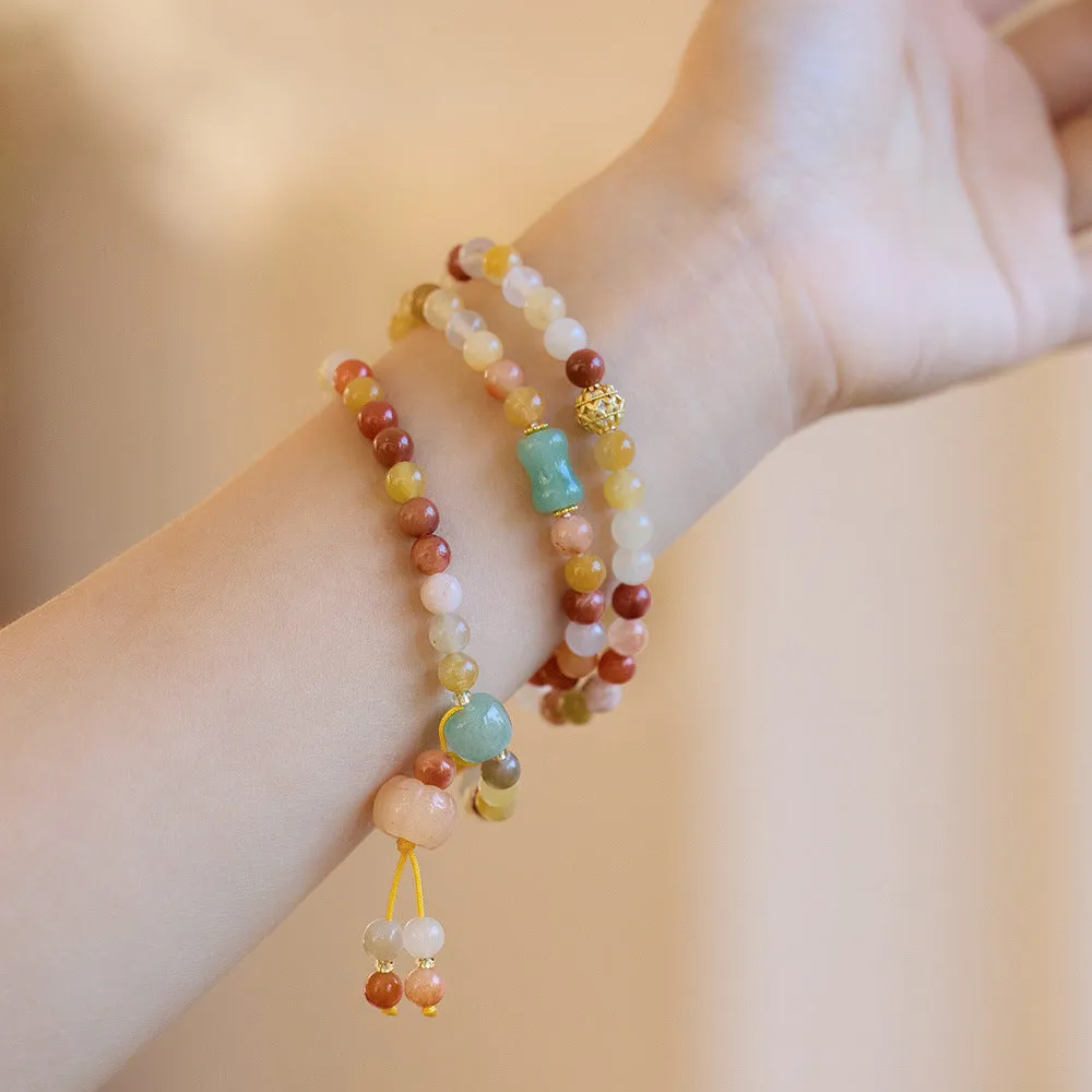 Women's Jinsi Jade bracelet with three-circle pumpkin design and tassels for 14-16cm wrists