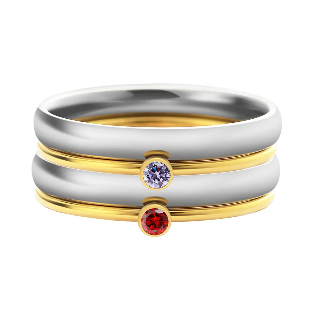 December colour birthstone engraved geometric ring in gold-tone titanium steel.