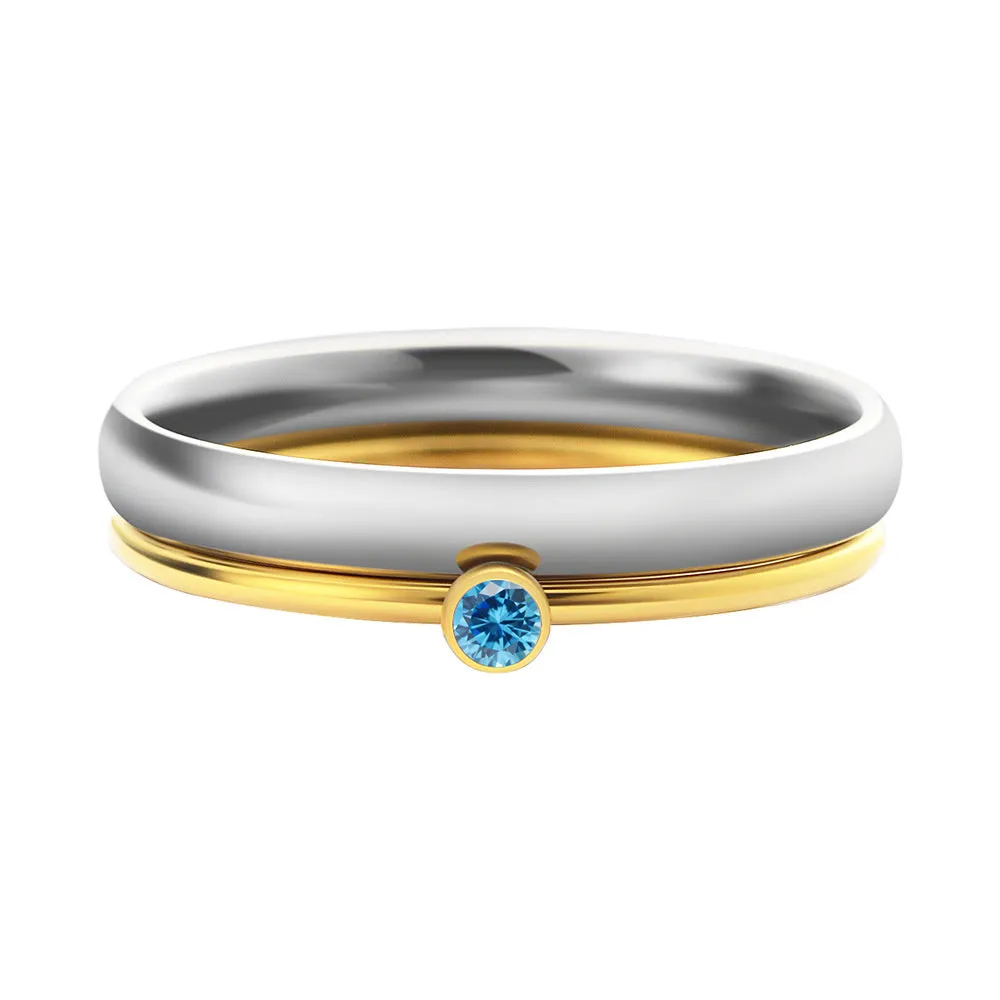 December colour birthstone engraved geometric ring in gold-tone titanium steel.