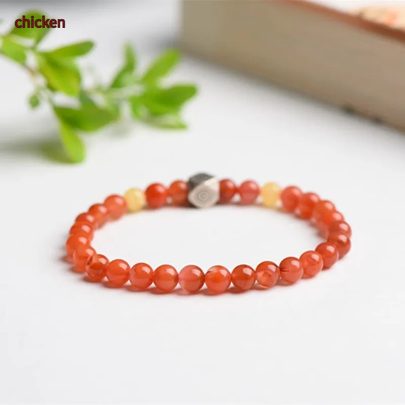 Natural Nanhong agate and beeswax zodiac bracelet with constellation charm in 6mm or 8mm bead size.