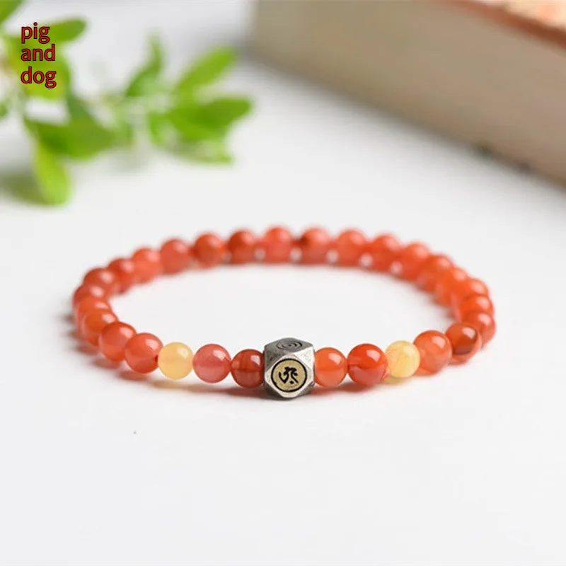 Natural Nanhong agate and beeswax zodiac bracelet with constellation charm in 6mm or 8mm bead size.