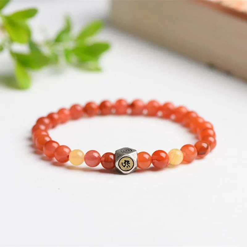 Natural Nanhong agate and beeswax zodiac bracelet with constellation charm in 6mm or 8mm bead size.
