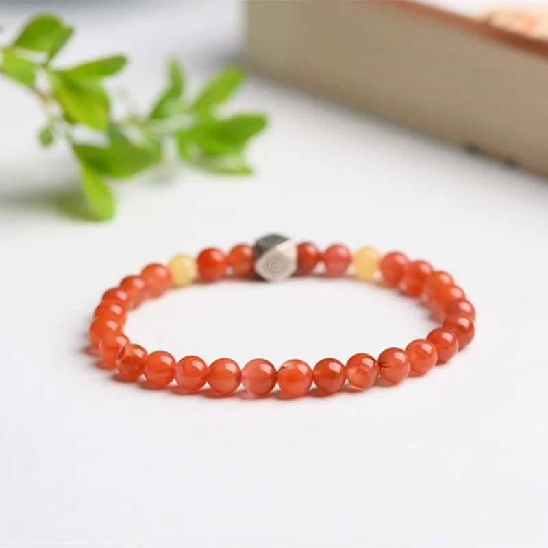 Natural Nanhong agate and beeswax zodiac bracelet with constellation charm in 6mm or 8mm bead size.