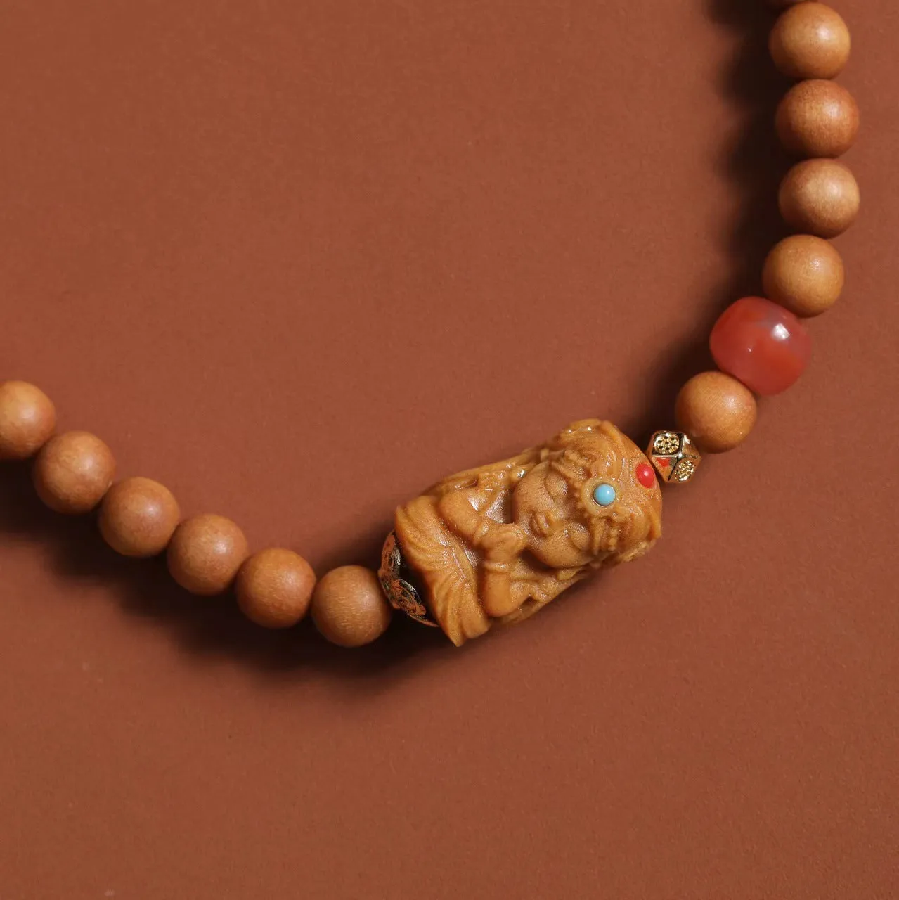 Brown wooden bracelet with South Red Zachilam double circle design in traditional Chinese style