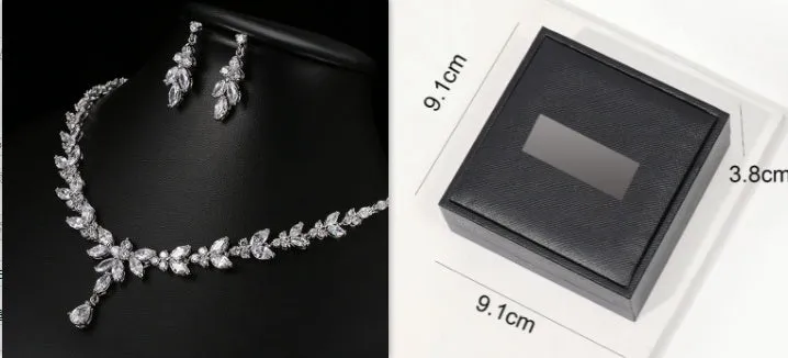 Women's alloy necklace and earrings set with gold-plated inlaid artificial gems and zircon chain on black box