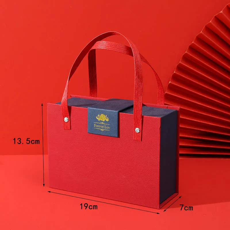 Gift set box containing watch, lipstick, perfume, and earrings in a red gift box with leather strap and metal case