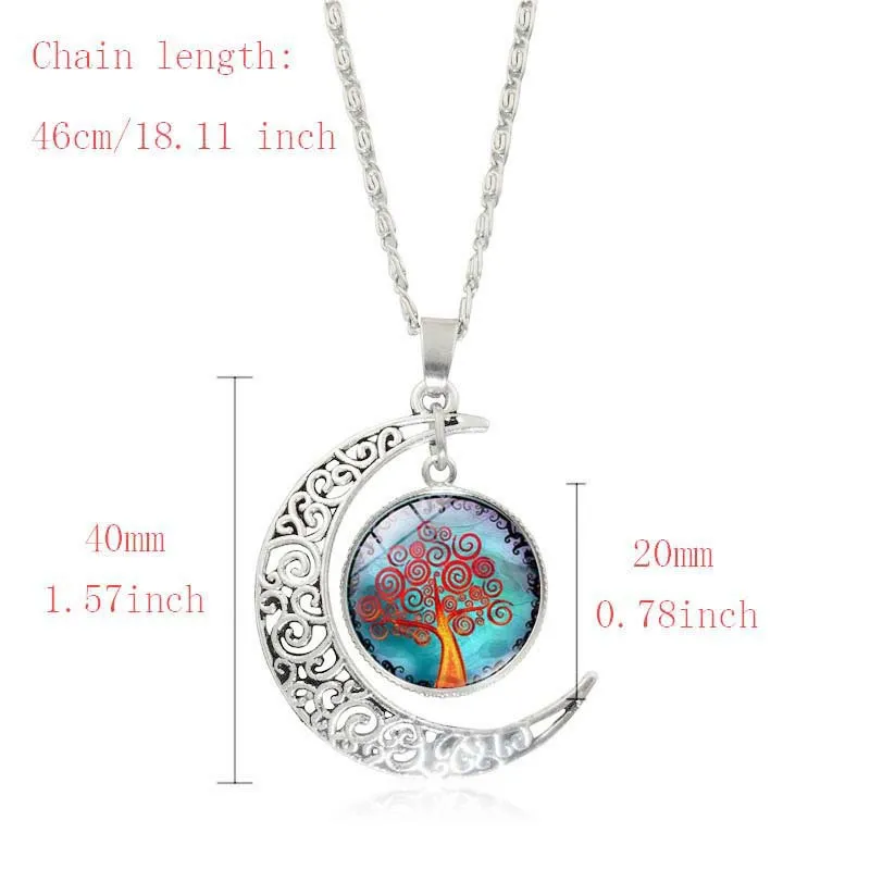 Tree of Life jewellery set with alloy and glass gem pendants: necklace, earrings, and bracelet on display