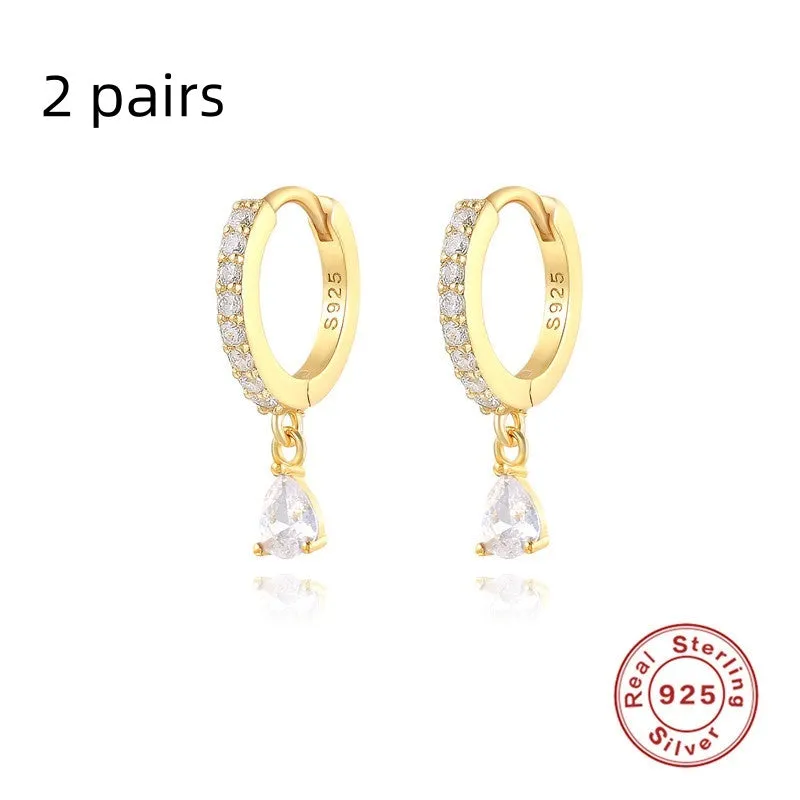 Geometric water drop sterling silver earring with a choice of gold or silver plating and decorative stone centre.