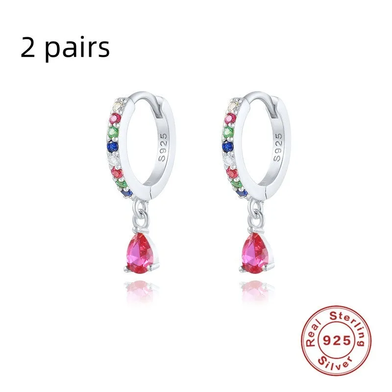 Geometric water drop sterling silver earring with a choice of gold or silver plating and decorative stone centre.