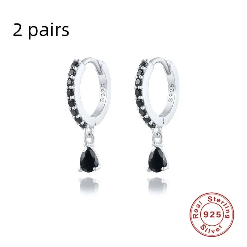 Geometric water drop sterling silver earring with a choice of gold or silver plating and decorative stone centre.