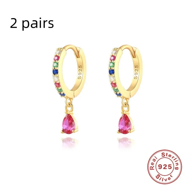 Geometric water drop sterling silver earring with a choice of gold or silver plating and decorative stone centre.