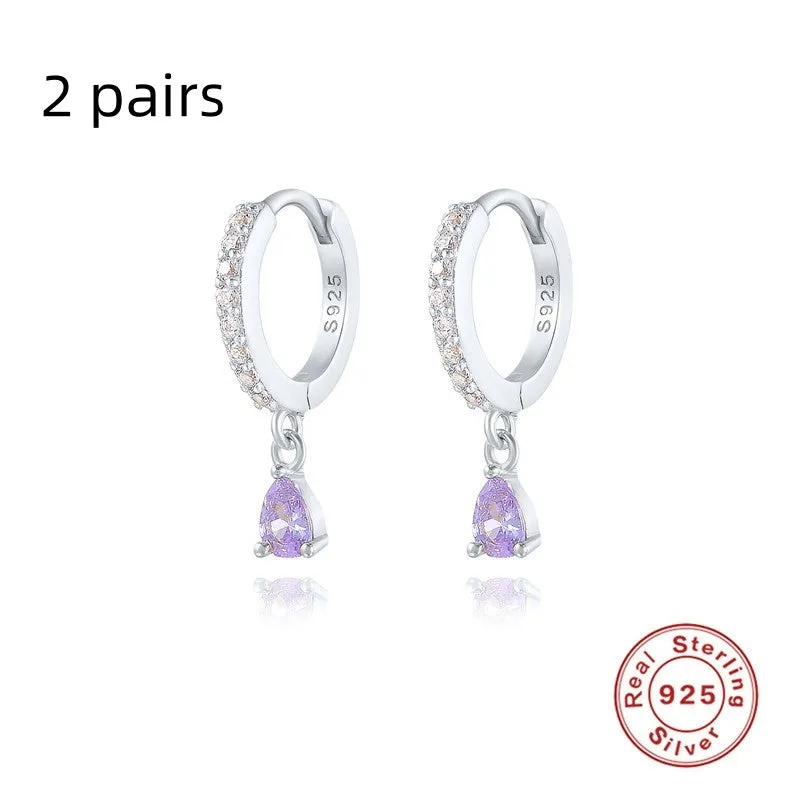 Geometric water drop sterling silver earring with a choice of gold or silver plating and decorative stone centre.