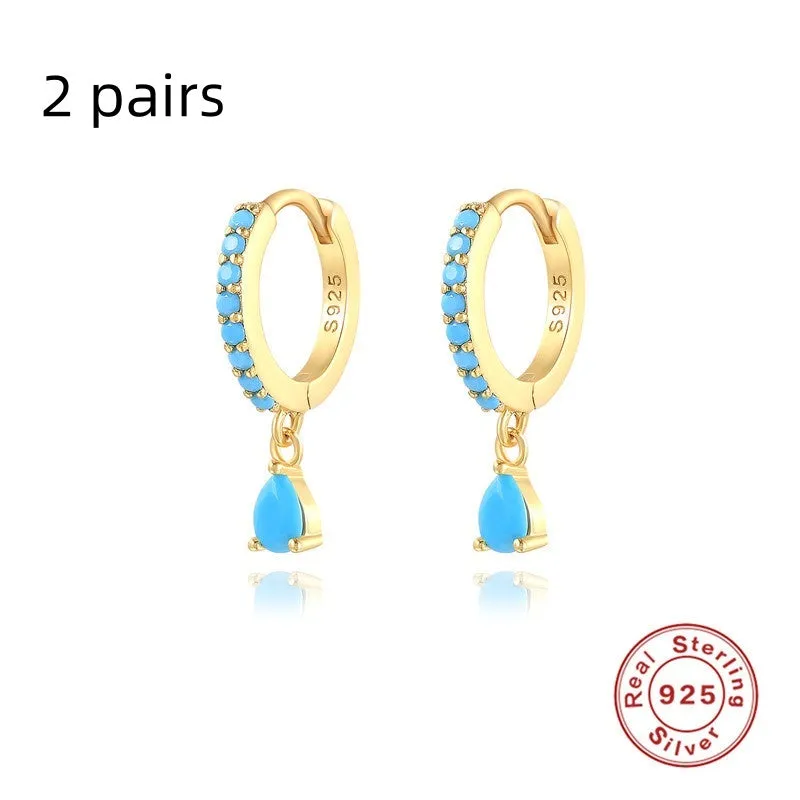Geometric water drop sterling silver earring with a choice of gold or silver plating and decorative stone centre.