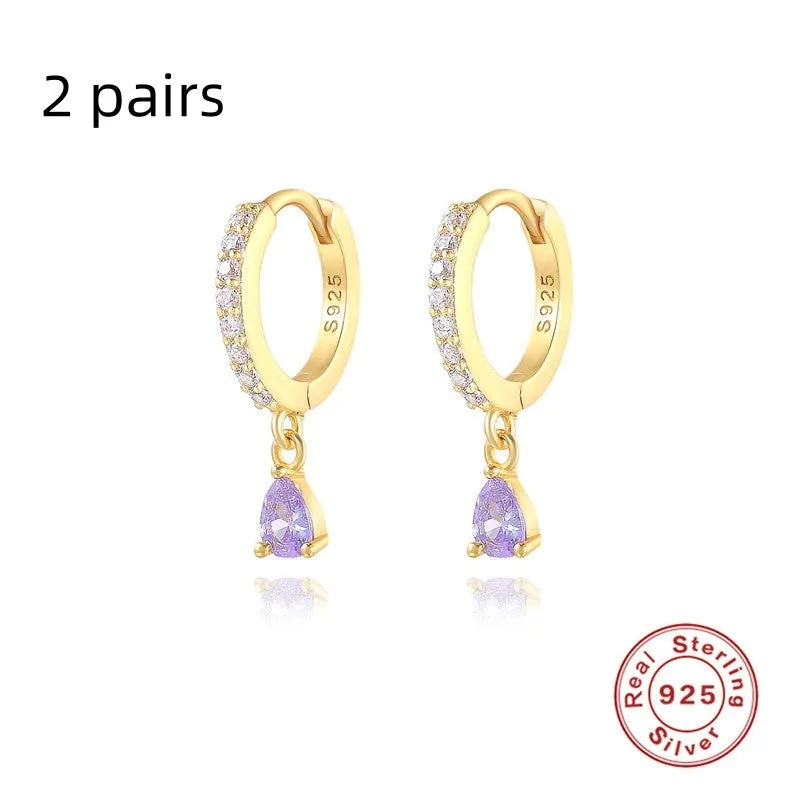 Geometric water drop sterling silver earring with a choice of gold or silver plating and decorative stone centre.