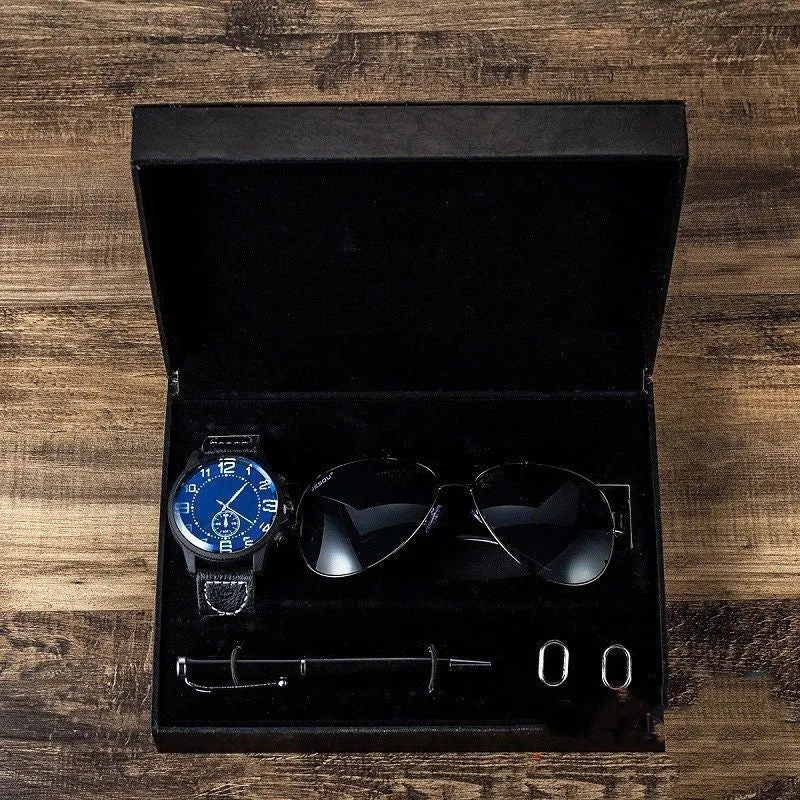 Men's gift set with brown leather watch, sunglasses, pen, and cufflinks in a gift box