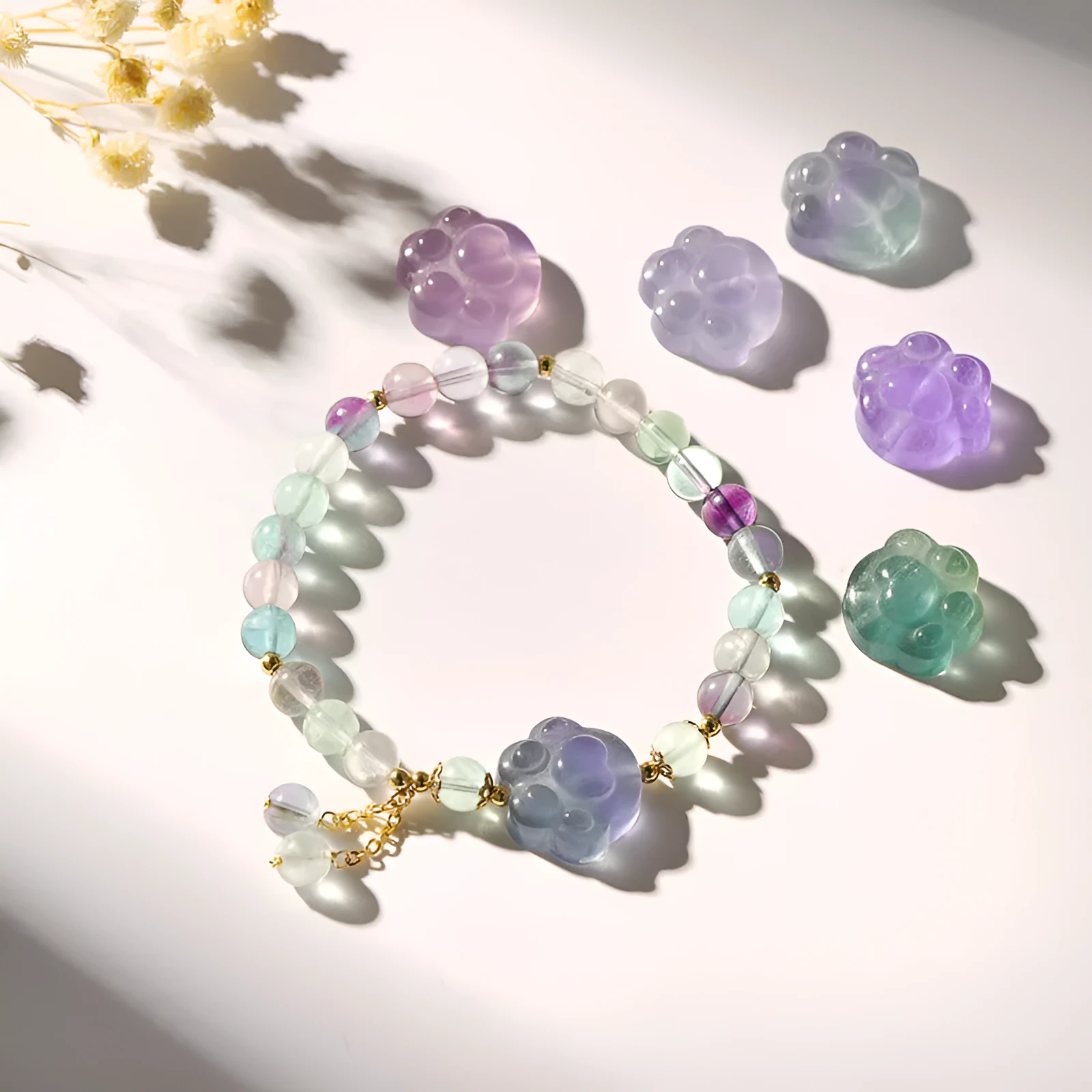 Women's natural crystal bracelet with manual craftsmanship showing animal zodiac designs