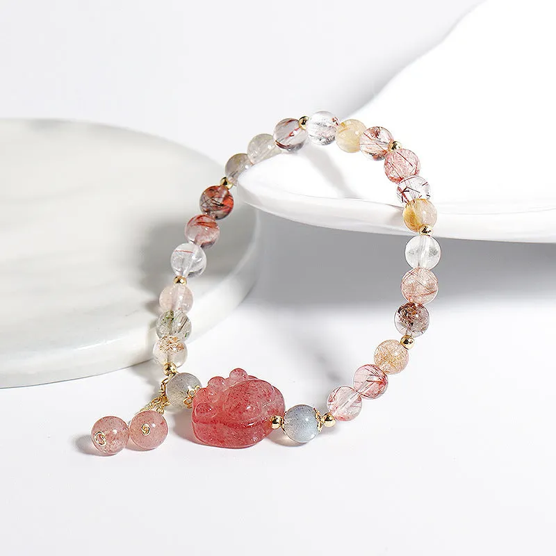 Women's natural crystal bracelet with manual craftsmanship showing animal zodiac designs