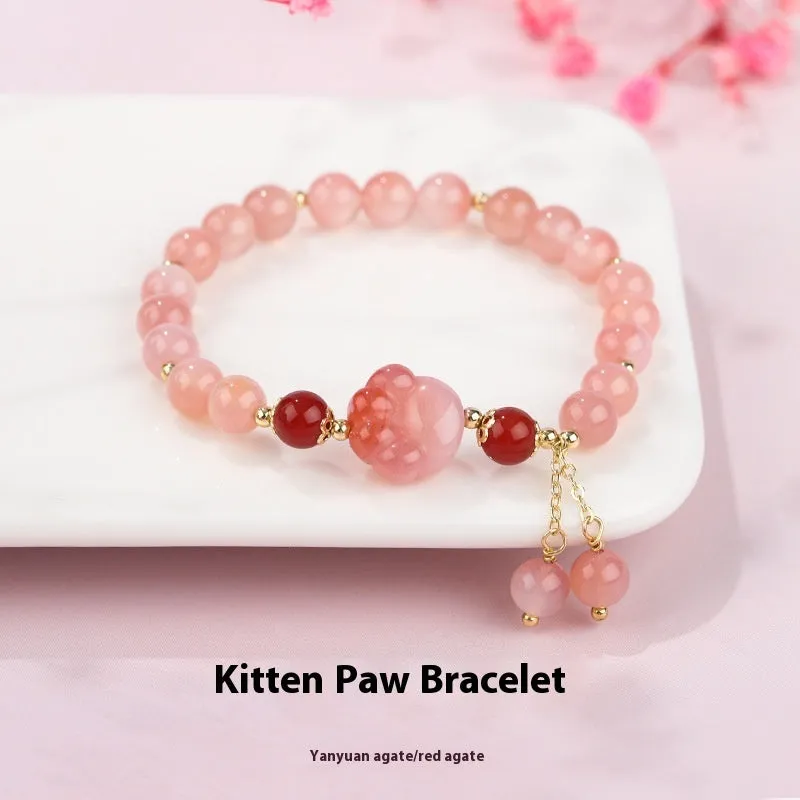 Women's natural crystal bracelet with manual craftsmanship showing animal zodiac designs