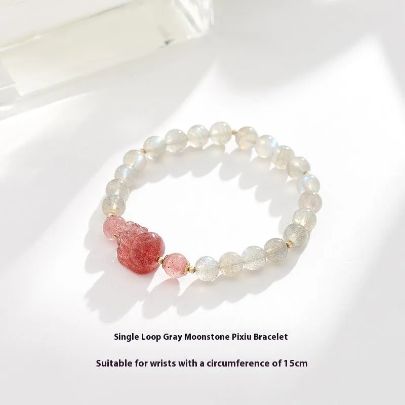 Women's natural crystal bracelet with manual craftsmanship showing animal zodiac designs