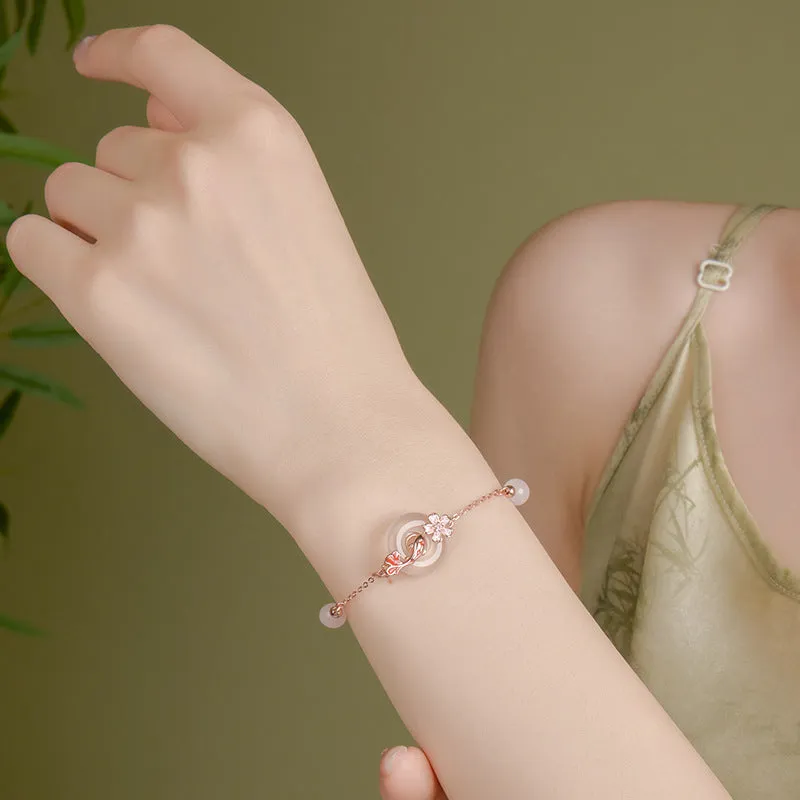 S925 sterling silver bracelet with white chalcedony crystal in a koi bracelet design for women.