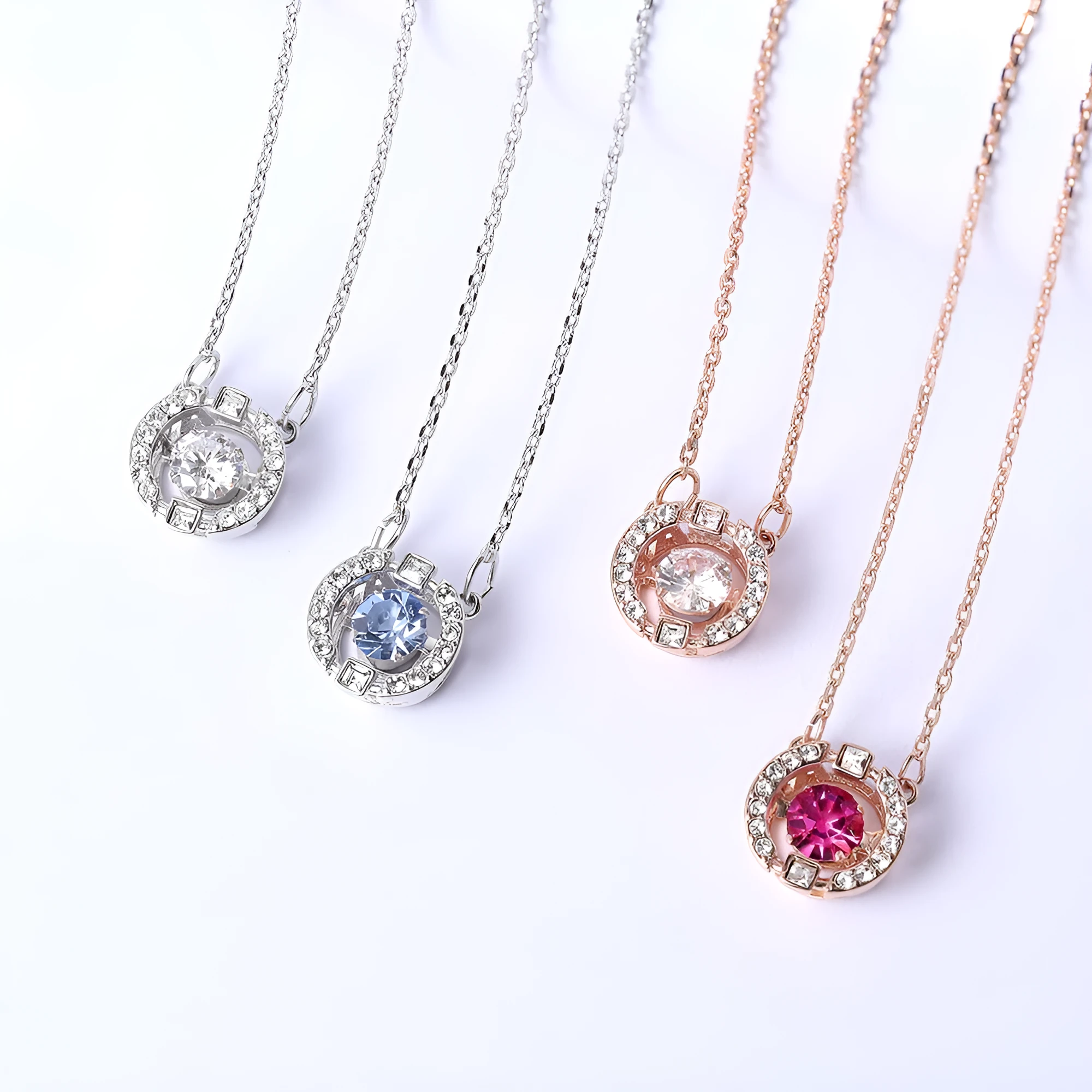 Colorful and lively geometric crown necklace pendant in copper with rhinestone details and cross chain