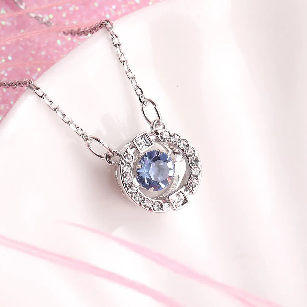Colorful and lively geometric crown necklace pendant in copper with rhinestone details and cross chain