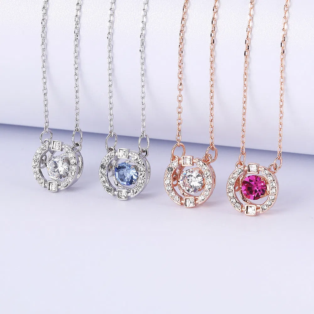 Colorful and lively geometric crown necklace pendant in copper with rhinestone details and cross chain