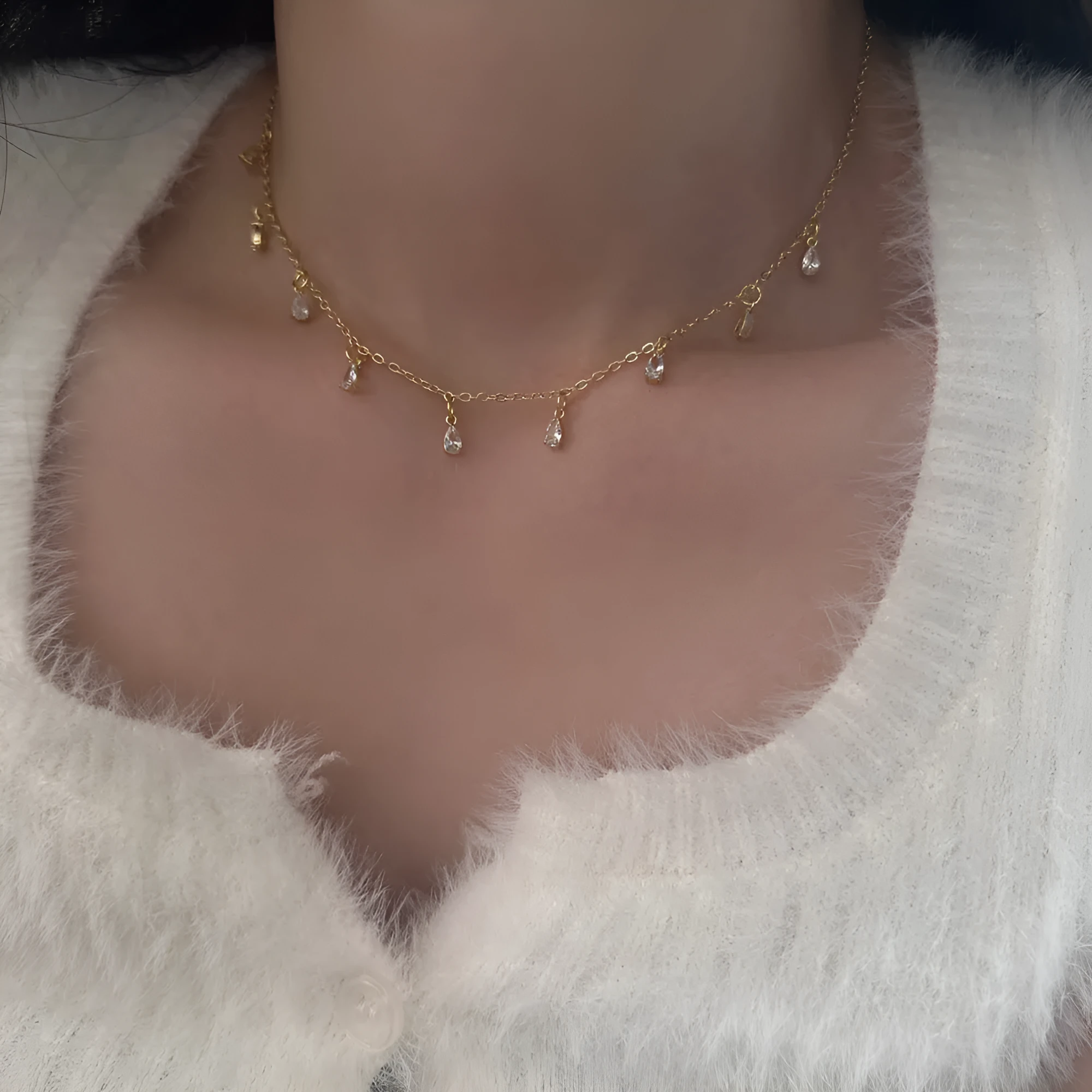 Zircon jewellery set showing necklace, earrings, and anklet with geometric meteor shower design