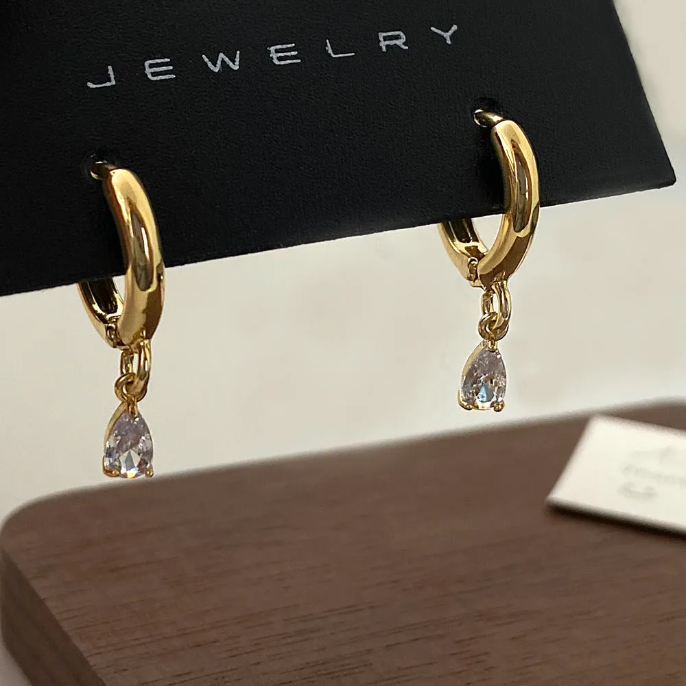 Zircon jewellery set showing necklace, earrings, and anklet with geometric meteor shower design