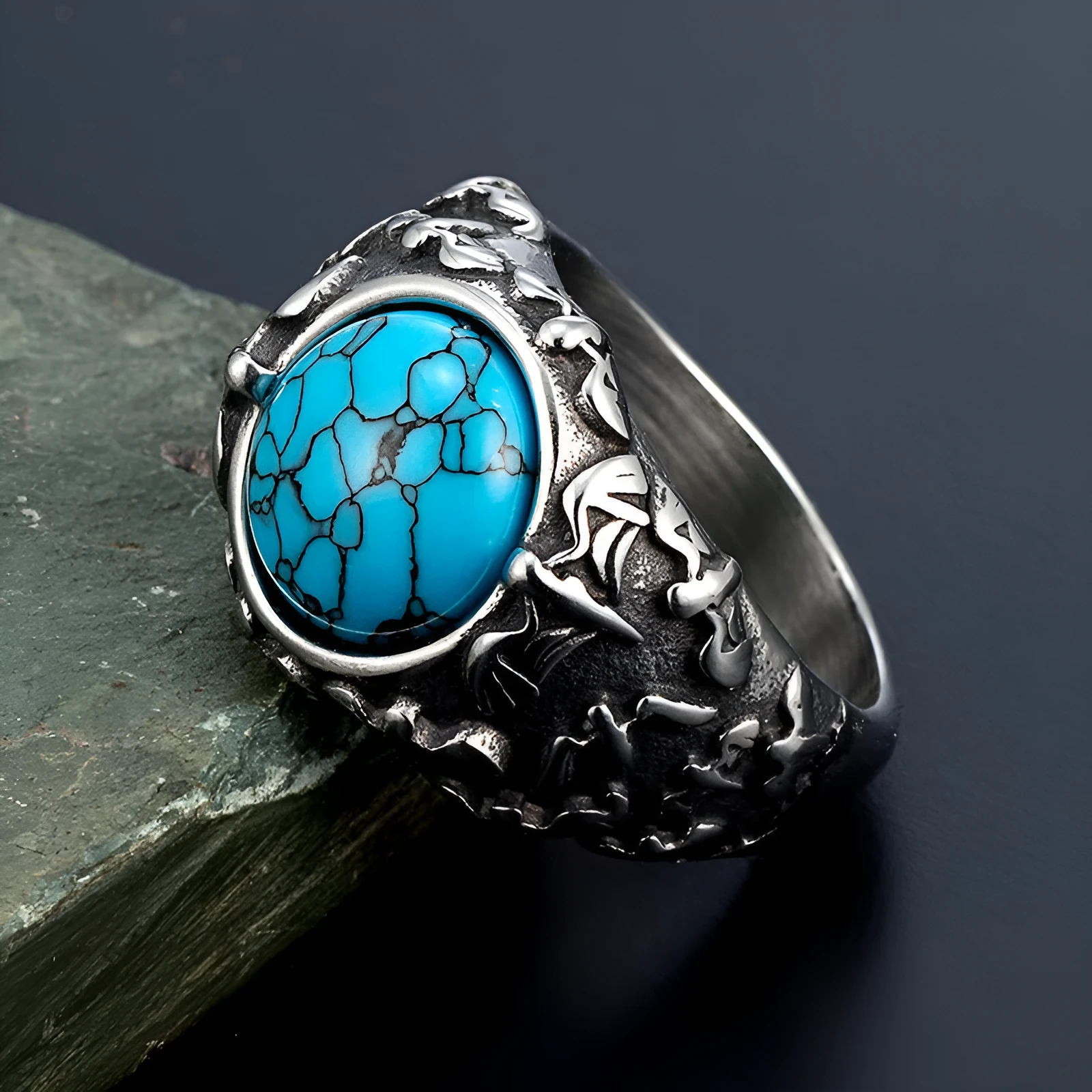 Retro titanium steel ring in steel colour, unisex design, showing surface detailing on solid metal band.
