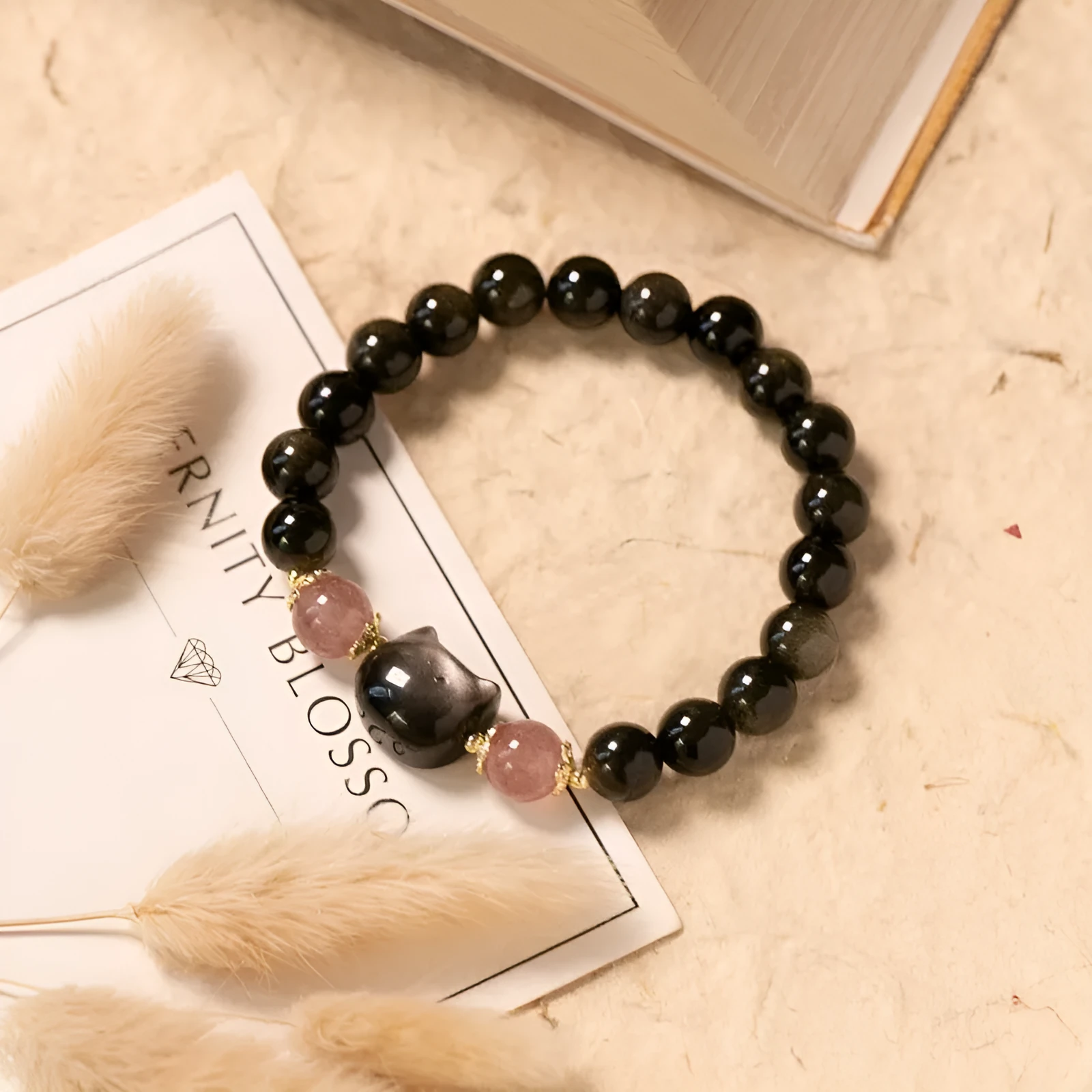 Black obsidian bracelet with 8mm beads and kitty charms in single circle design