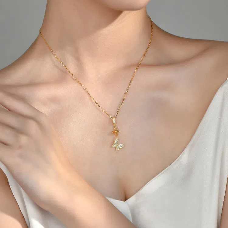 Japanese Korean style light luxury full rhinestone tassel butterfly micro-inlaid necklace on display