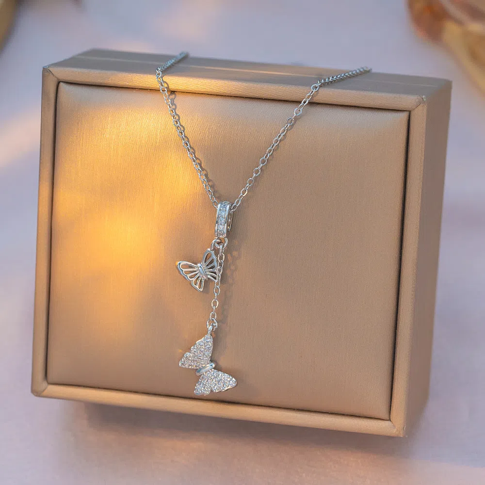 Japanese Korean style light luxury full rhinestone tassel butterfly micro-inlaid necklace on display