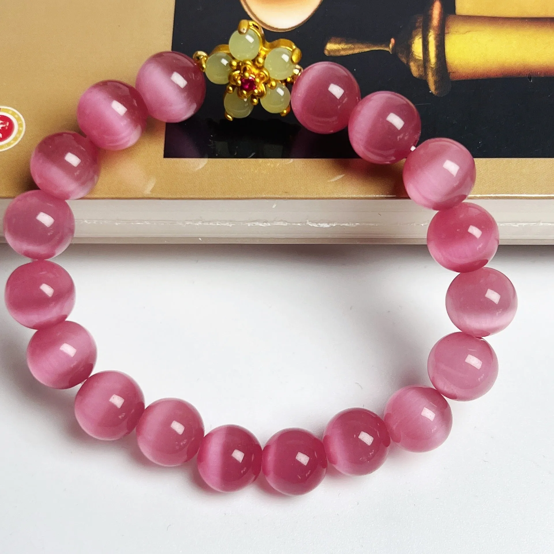 Handmade glass bracelet with flower beads in yellow, pink, white, green colours