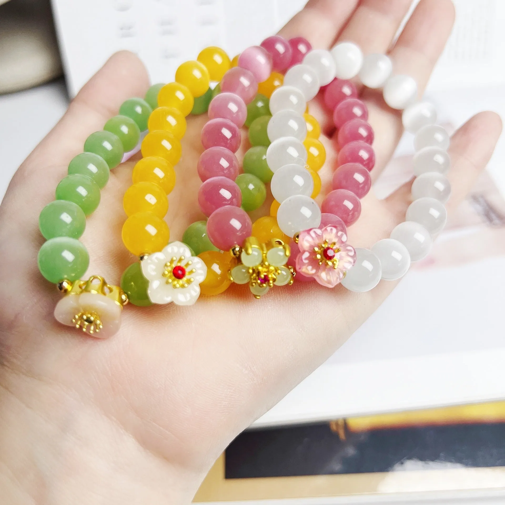Handmade glass bracelet with flower beads in yellow, pink, white, green colours