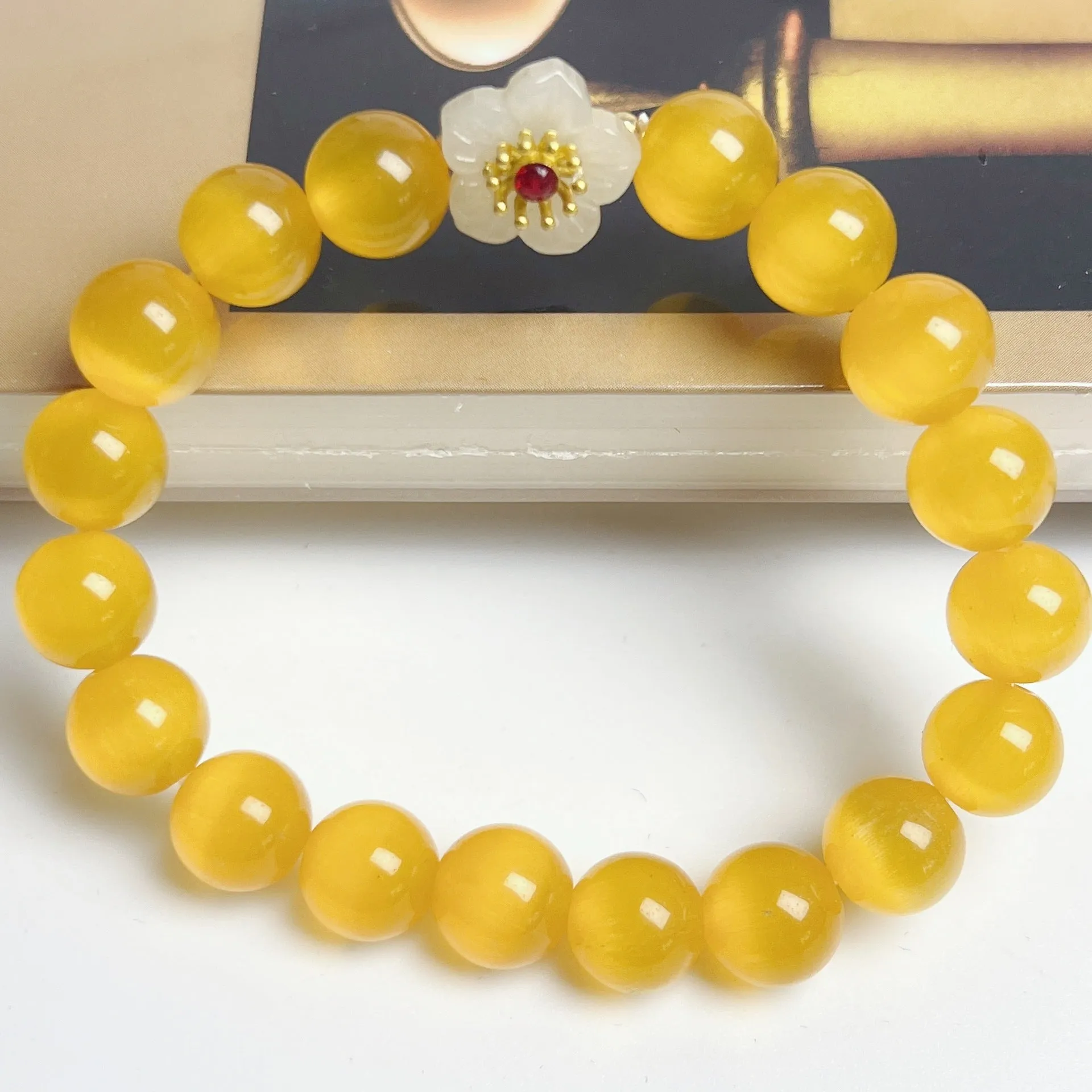 Handmade glass bracelet with flower beads in yellow, pink, white, green colours