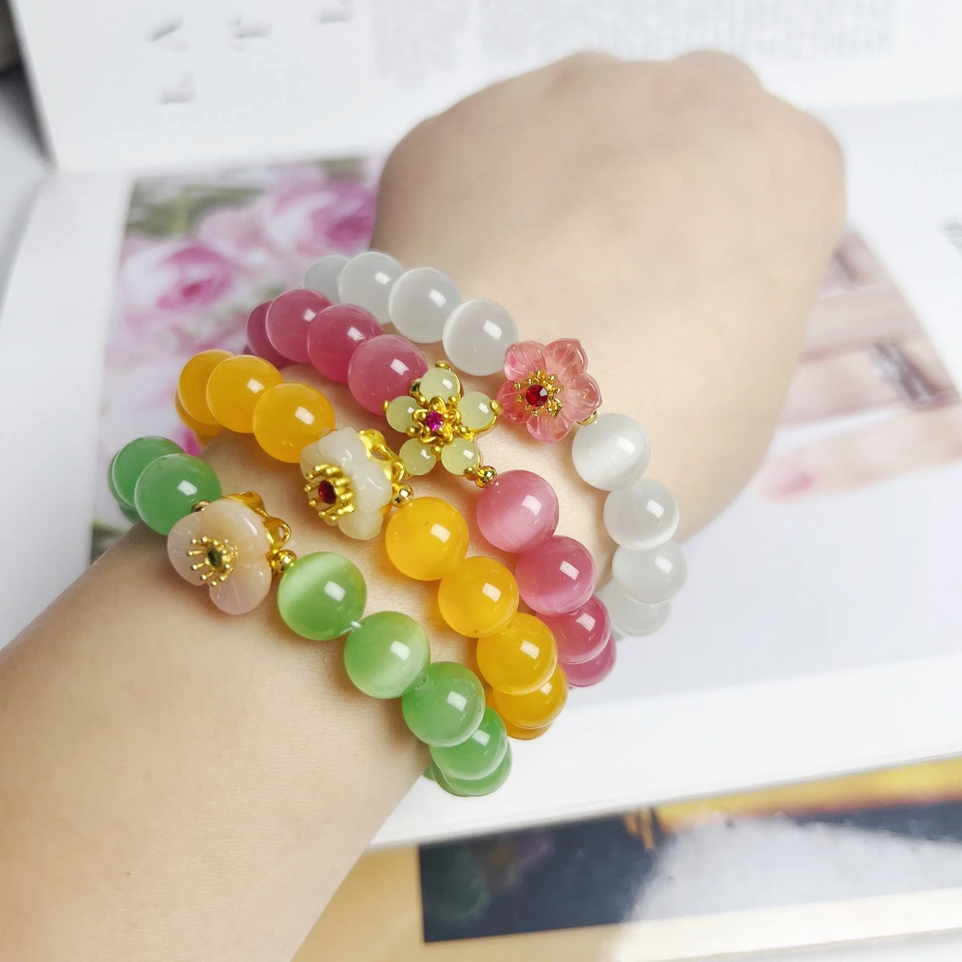 Handmade glass bracelet with flower beads in yellow, pink, white, green colours