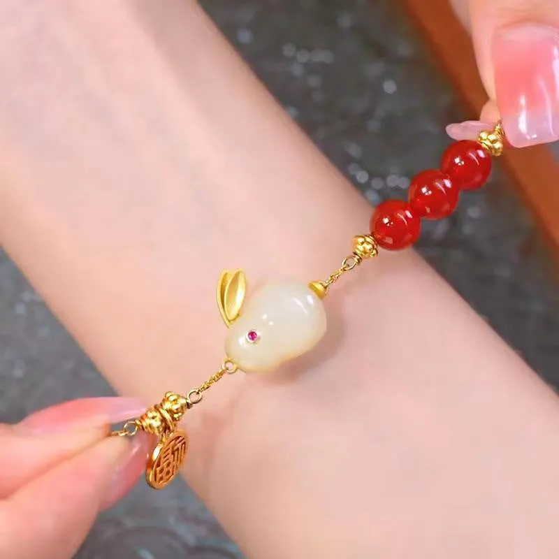 Green jade hare bracelet for women with Chinese style zodiac animal design and lily decorations