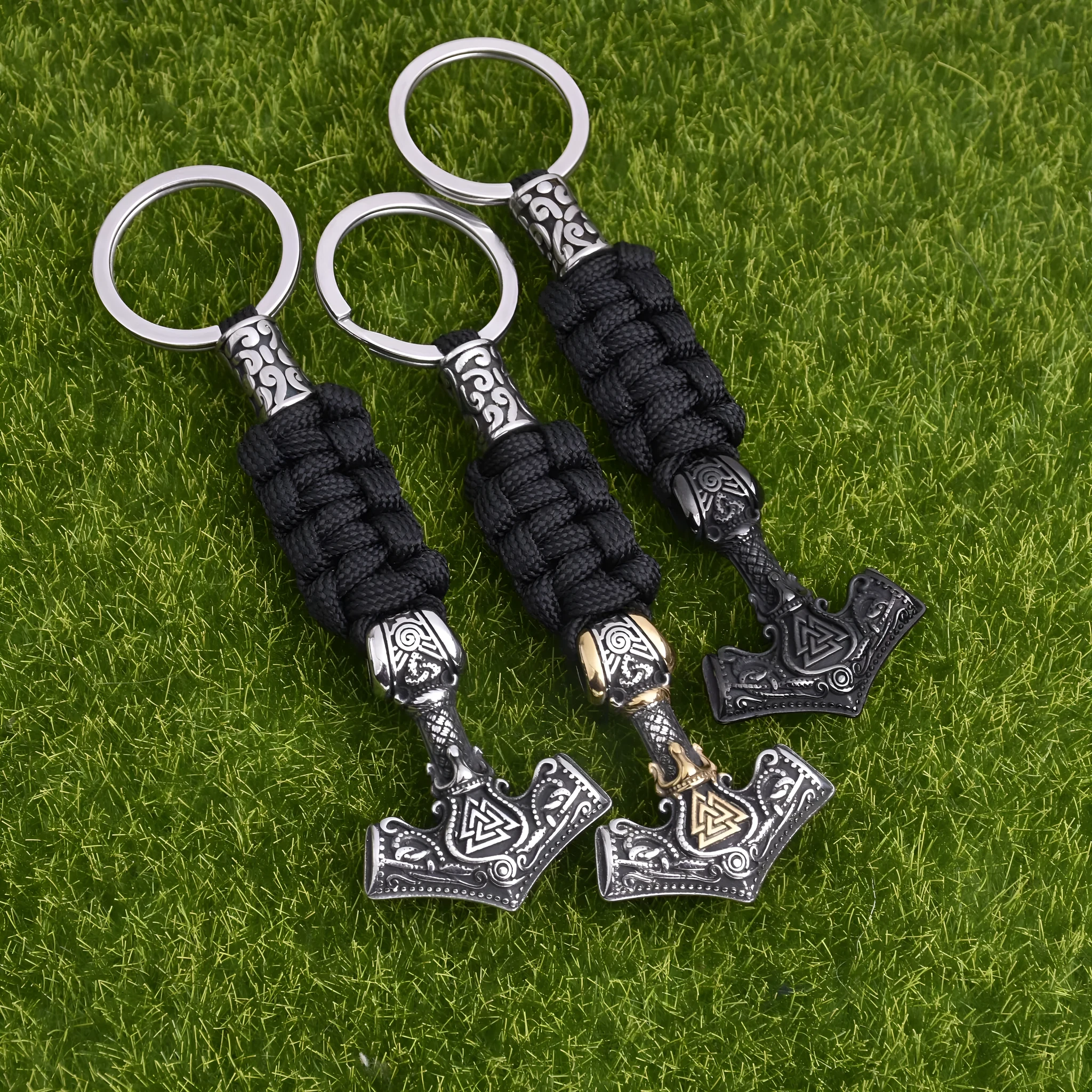 Viking triangle rune impactor keychain in stainless steel with animal motif, available in three metal finishes
