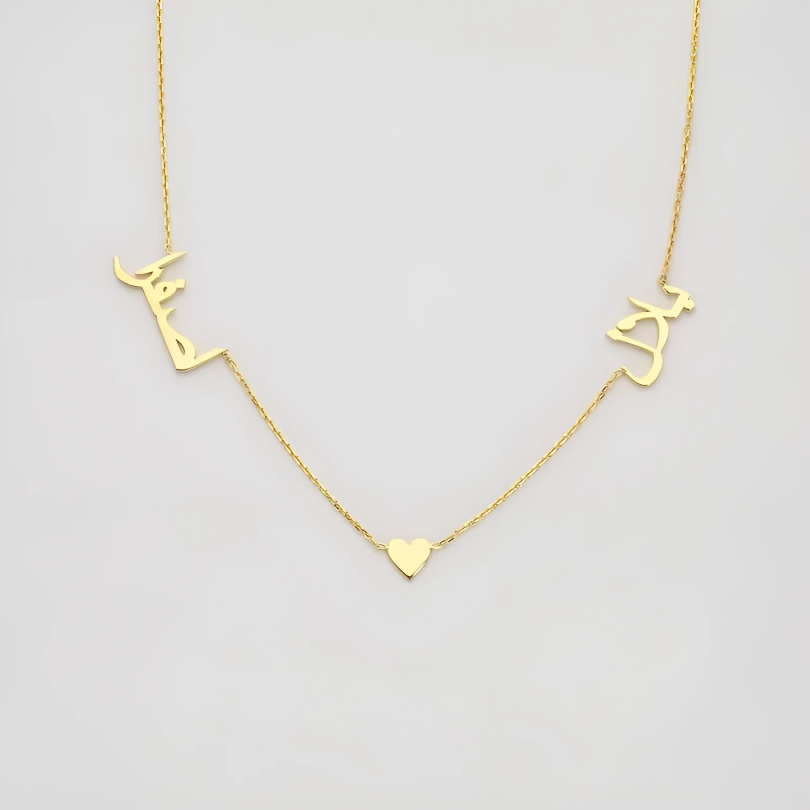 Stainless steel necklace in gold finish on a neutral background showing chain links and length options