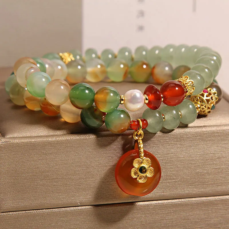 Women's peacock green agate double ring bracelet with safety buckle closure and rhinestone accents