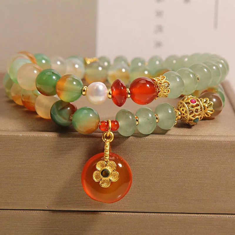 Women's peacock green agate double ring bracelet with safety buckle closure and rhinestone accents