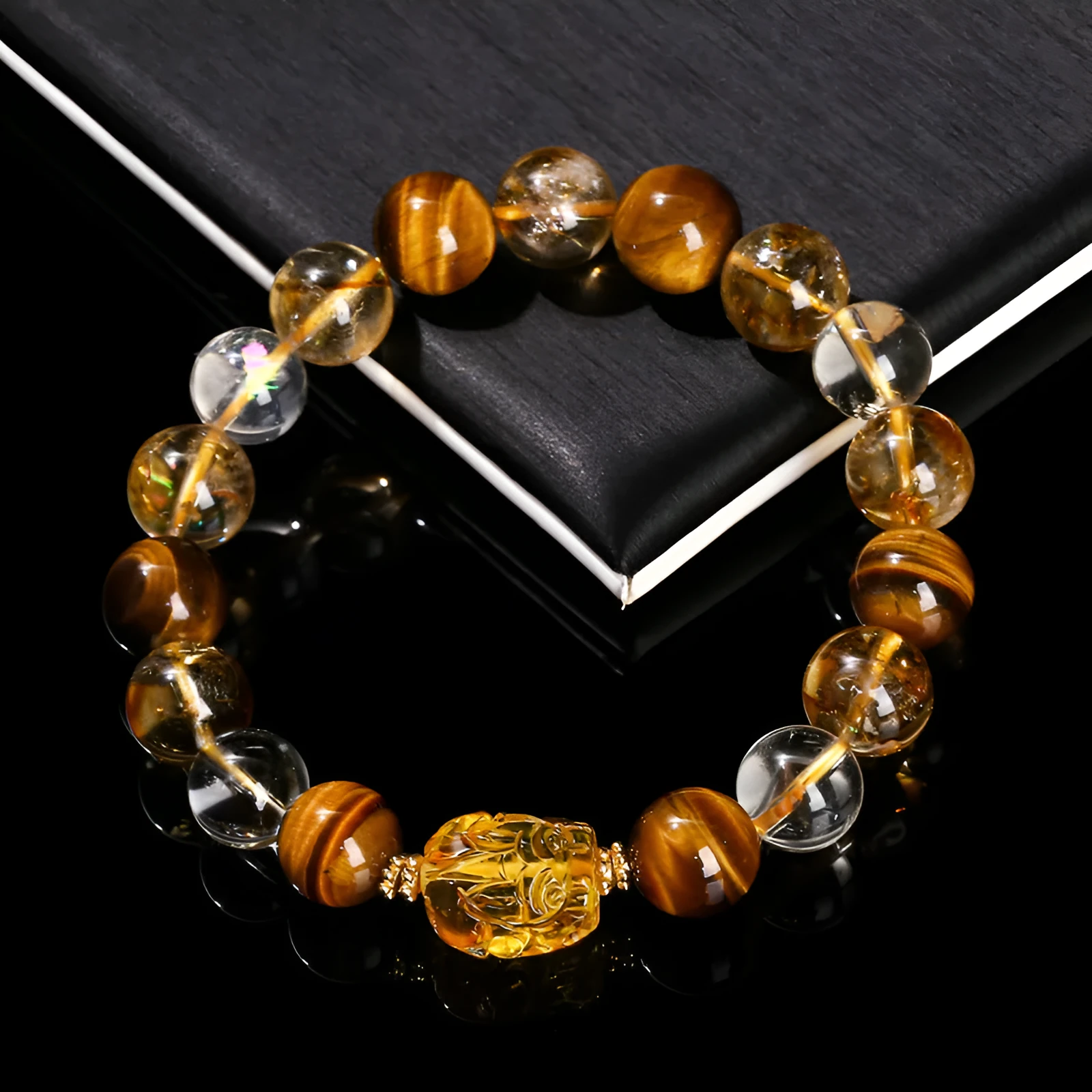 5A natural yellow tiger's eye and citrine bracelet with 10mm geometric beads and a beeswax pi xiu charm.